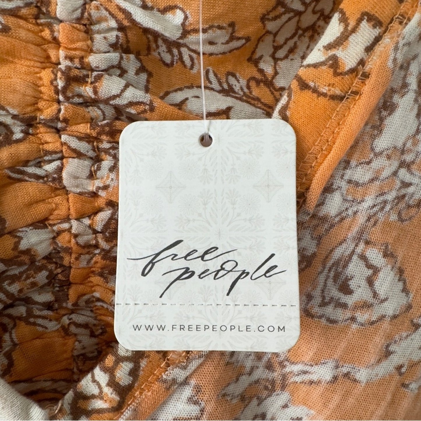 Free People Say the Word Top in Blood Orange Combo Floral Ruched long sleeve NWT
