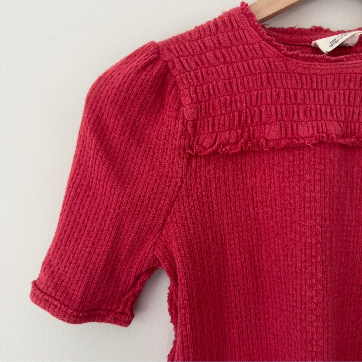 Free People We the Free Smocked Neck Short Sleeve Top Textured Knit Raw Hem EUC