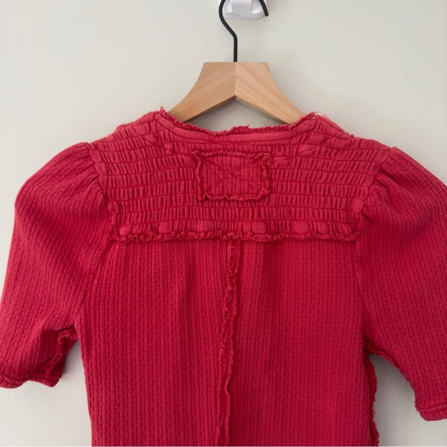 Free People We the Free Smocked Neck Short Sleeve Top Textured Knit Raw Hem EUC