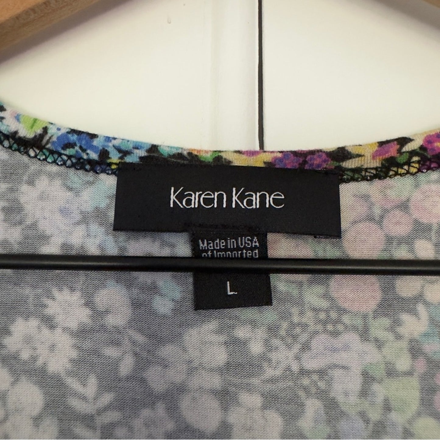 Karen Kane colorful/black and white floral top asymmetric hem tunic crew neck L