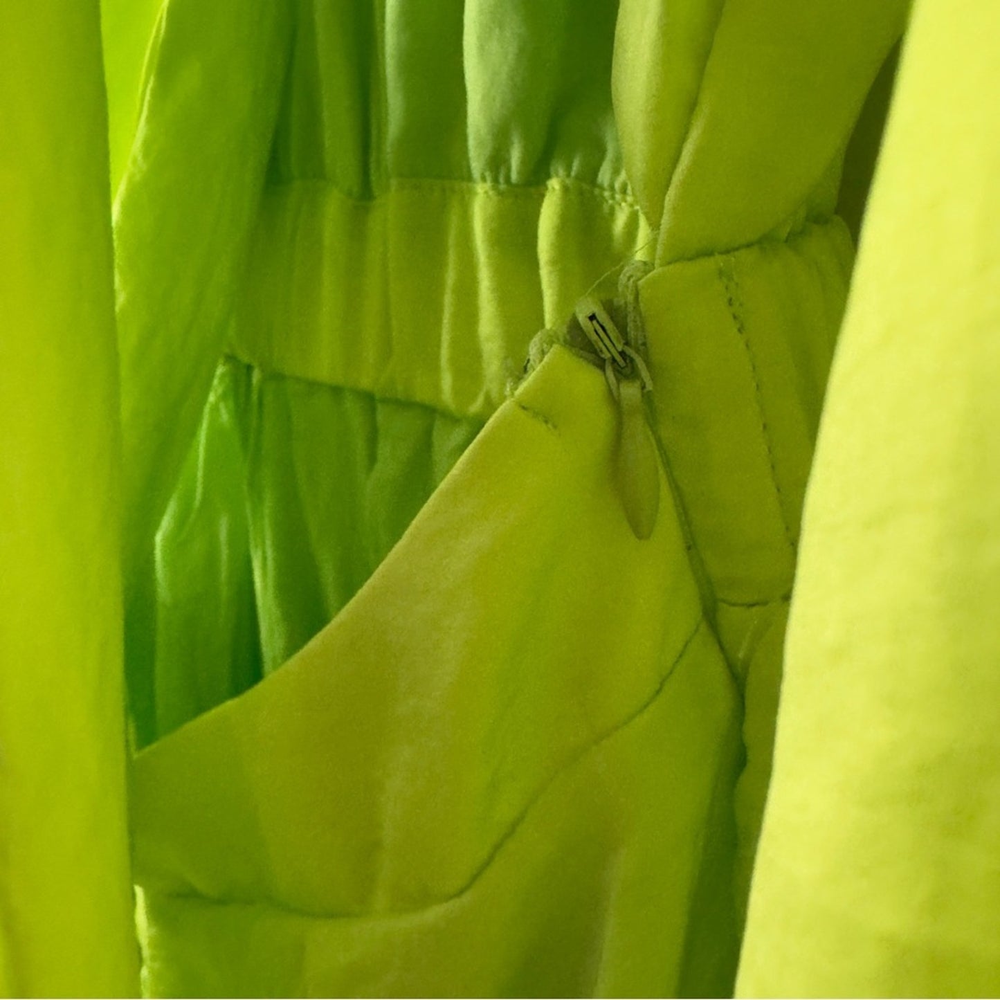 SNDYS x Revolve Pluto Romper in Neon Green Bright flared long sleeves cut out 4
