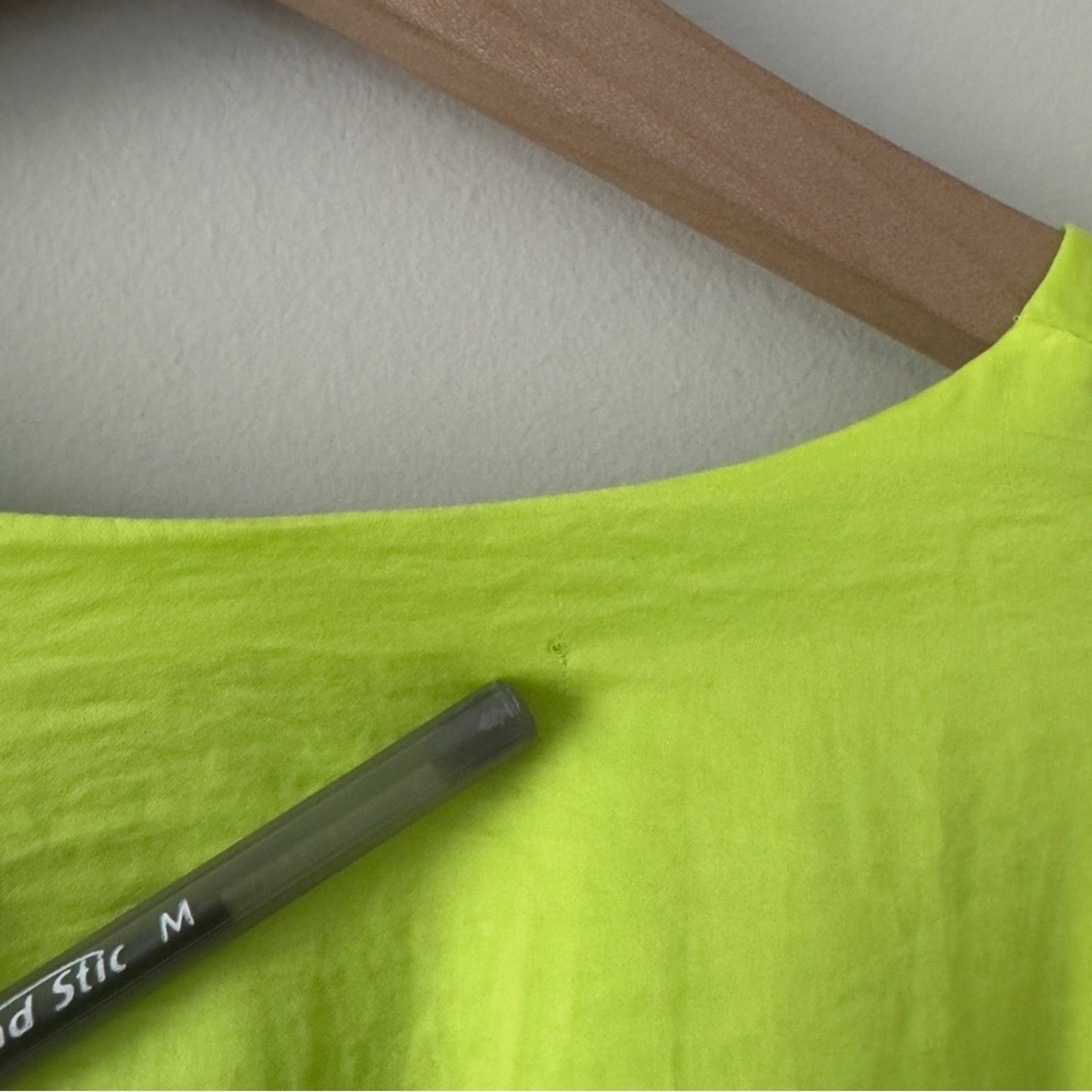 SNDYS x Revolve Pluto Romper in Neon Green Bright flared long sleeves cut out 4